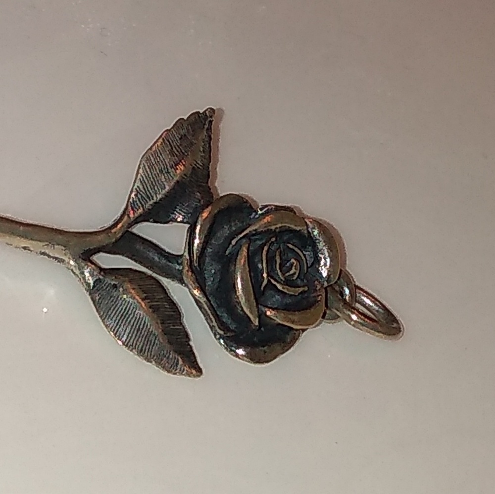 Retired JA Rose charm